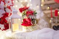 lantern with candle, decorative bird cage with flowers on blurry background with golden lights bokeh. Wedding or 14 February Royalty Free Stock Photo