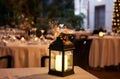 Lantern with candle terrace restaurant and flowers