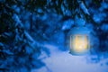 Lantern for Christmas in the woods under the tree. Lantern with