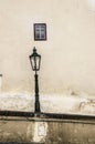 Lantern on cracked wall