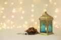 Lantern and Dates fruits in front of bokeh Background