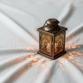 Lantern emits a warm glow emphasizing its handcrafted detailing. Royalty Free Stock Photo