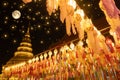 Lantern Festival in Lamphun people hang colorful light lanterns at Wat Phra That Hariphunchai Temple full moon