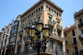 Lantern in front of the facade of one of the beautiful houses on La Rambla in Barcelona