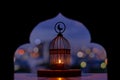 Lantern that have moon symbol on top with city bokeh light.