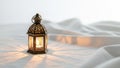 Lantern with intricate cut out patterns casting light on white Royalty Free Stock Photo
