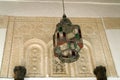 Lantern of metal and colored glass in an Arab building.