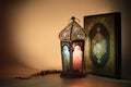 Lantern and Muslims Holy book Quran.