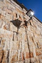 Lantern in old stone wall Royalty Free Stock Photo