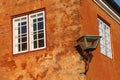 The lantern on the orange wall