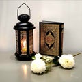 The lantern of Ramadan is black in color, luminous, decorated with wooden motifs, next to the Holy Quran, with a few white roses Royalty Free Stock Photo