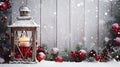 Lantern with red burning candle still life with Christmas balls, pine cones and spruce branches. Royalty Free Stock Photo