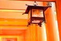 Lantern and red torii gates at Fushimi Inari Royalty Free Stock Photo