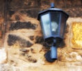 Lantern on a stone wall Royalty Free Stock Photo