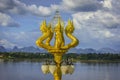 Lantern surrounded by golden Naga statues