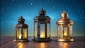 Three vintage lanterns with candles on a wooden table under a starry night sky Royalty Free Stock Photo