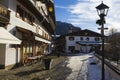 Lantern and traditional German houses in the alpines in winter