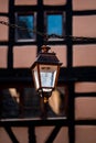 Lantern and typical facade in Riquewhir, Alsace, France