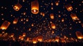 Lanterns glowing in night sky Royalty Free Stock Photo
