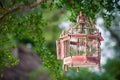 Lanterns hanging from the trees to decorate at sunset bird cage Royalty Free Stock Photo