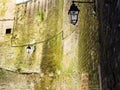 Lanterns on old stone wall of Chateau de Sedan