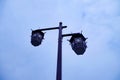 Lanterns with simple traditional Chinese designs are seen on street lamps along a street in Xiamen, China. It combines modern