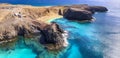 Lanzarorote Canary islands beach scenery. Aerial drone panoramic high angle view of popular scenic Papagayo beach