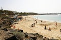 LANZAROTE, SPAIN - APRIL 18, 2018: Beautiful view of Playa Dorada beach with bathers on the sand, Lanzarote, Canary Islands