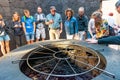 LANZAROTE, SPAIN - DEC 13, 2018: People watching on Barbecue with volcanic heat in restaurant at Timanfaya National Park,