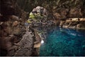 Tourist visiting famous cave Los Jameos del Agua in Lanzarote, Canary islands, Spain.