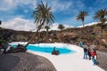 Tourist visiting famous cave Los Jameos del Agua in Lanzarote, Canary islands, Spain.