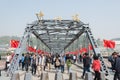 LANZHOU, CHINA - OCT 2 2014: Visitor at Sun Yat-Sen Bridge (Zhongshan Qiao). a famous First Bridge across the Yellow River in Lan