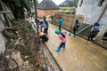 Lao Cai, Vietnam - Aug 30, 2017: Volunteers - the farmers cleaning village road on a regular social activity in Y Ty, Bat Xat dist