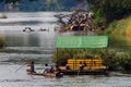 Lao people with boat and house on Mekong Delta, don Det, Laos