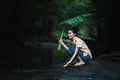 Lao woman Local Vientiane, Laos, are relaxing on the river. Royalty Free Stock Photo