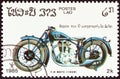 LAOS - CIRCA 1985: A stamp printed in Laos from the `Centenary of Motorcycle` issue shows a F.N. M67C, 1928, circa 1985. Royalty Free Stock Photo