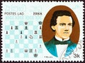 LAOS - CIRCA 1988: A stamp printed in Laos from the `Chess Masters` issue shows Paul Morphy, circa 1988.