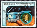 LAOS - CIRCA 1984: A stamp printed in Laos from the `Space Exploration` issue shows Newton and Lunokhod 2, circa 1984.