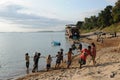 Laos: Fisher men and children seen at the Mekong River cruise between Champasak and Pakse City Royalty Free Stock Photo