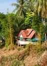 Idyllic ancient Laotian bungalow in the jungle, Laos