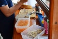 Laotian people cooking Khao Jee Sandwich or Baguette Sandwich