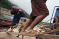 Laotian porters on the Mekong River