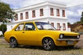 Vivid yellow Chevrolet Chevette sedan car in the historical center of the city of Lapa Royalty Free Stock Photo