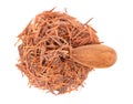 Lapacho herbal tea in wooden spoon, isolated on white background. Natural Taheeboo dry tea. Pau d'arco herb. Tabebuia