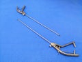 Laparoscopic Needle Holder In Blue Background Royalty Free Stock Photo