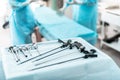Laparoscopic surgical instruments on sterile desk in operating room Royalty Free Stock Photo