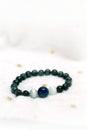 Lapis lazuli bead and Labradorite Crystal lucky stone bracelet bead on white towel background.fashion with believe in Add charm,pr Royalty Free Stock Photo