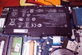 Laptop All Parts when uncover.Laptop Battery,Processor,Hard disk,Ram and Fan.Computer repair.Electronic service center.Technician