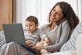 Laptop, baby or mom on a phone call to relax in home sofa in conversation or communication. Smile, multitasking or happy