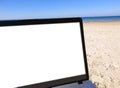 A Laptop and Beach Background Royalty Free Stock Photo